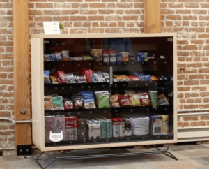 Bodega cabinet stocked with snacks