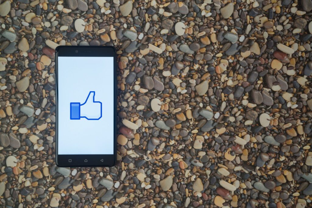 Facebook thumbs up on phone
